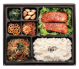 Grilled salmon fillet lunch box with rice and side dishes