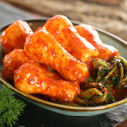 Whole radish kimchi in traditional clay pot